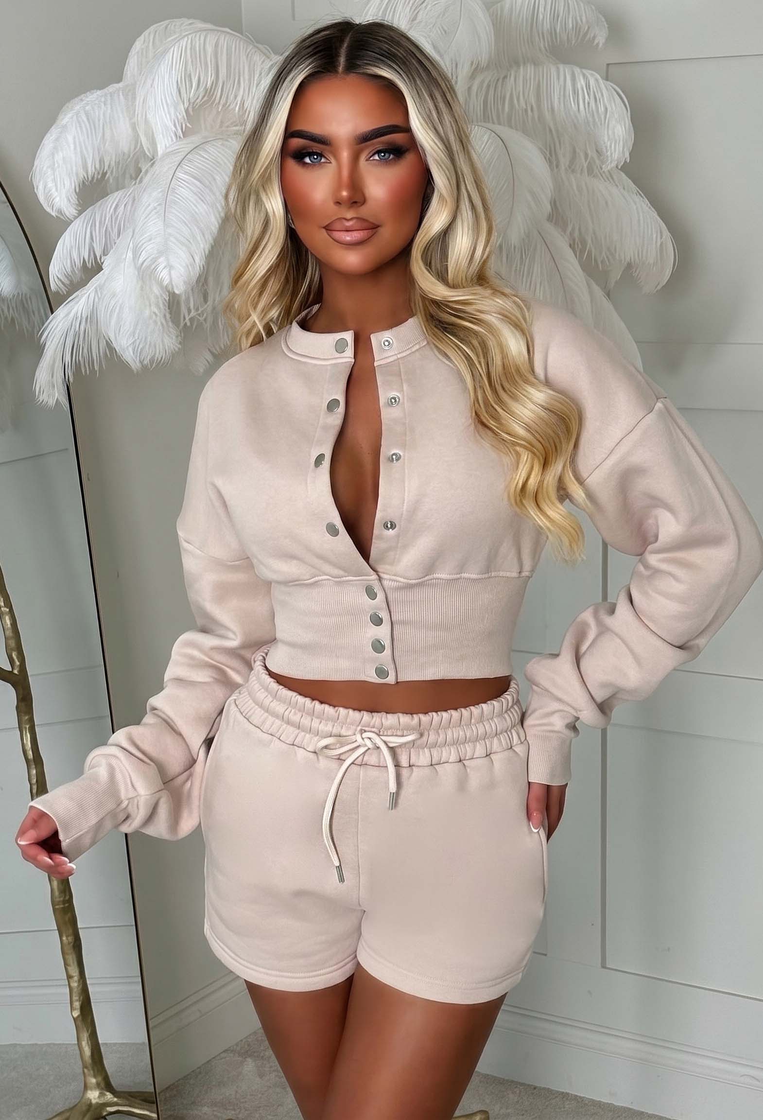 Cream button down lounge co-ord with a cropped long sleeve shirt, cinched waist and matching drawstring shorts.