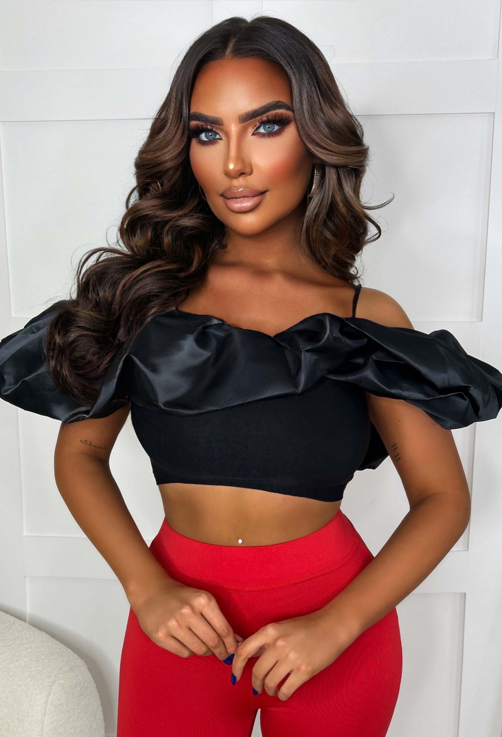 black ruffle shoulder top