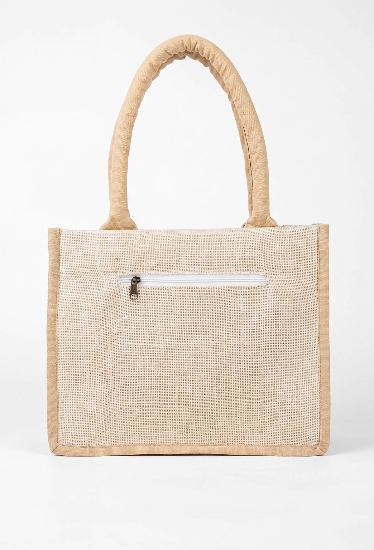Beige beach beaded bag with sturdy handles, beaded leaf details and BEACH lettering on the front.