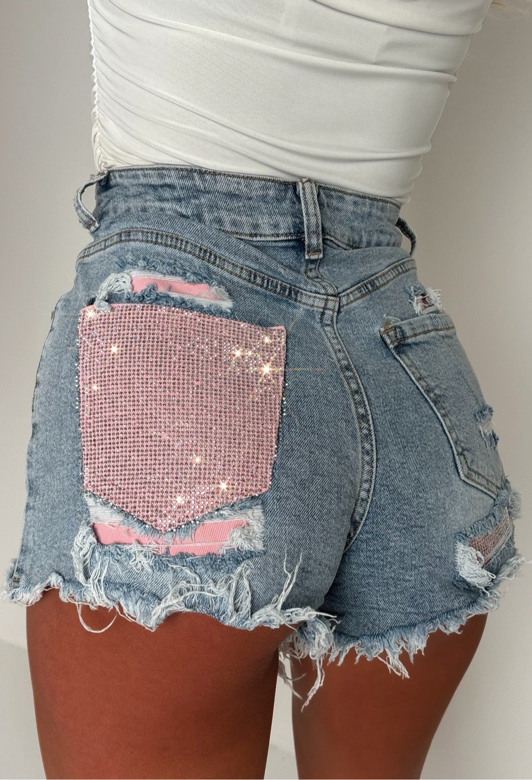 Bring On The Drama Mid Wash Ripped Denim Hot Fix Pink Pocket Shorts