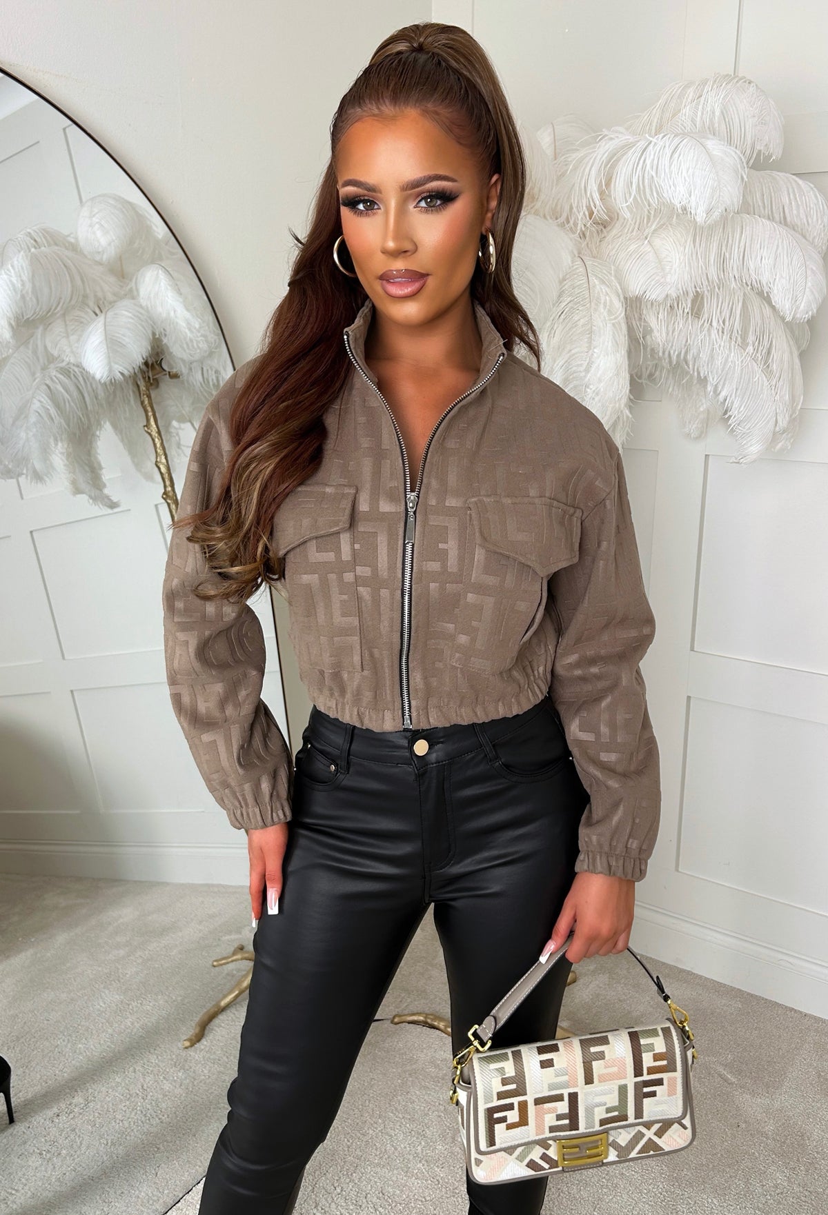 Mocha monogram jacket with a zip front, cropped fit and flap chest pockets in textured fabric.