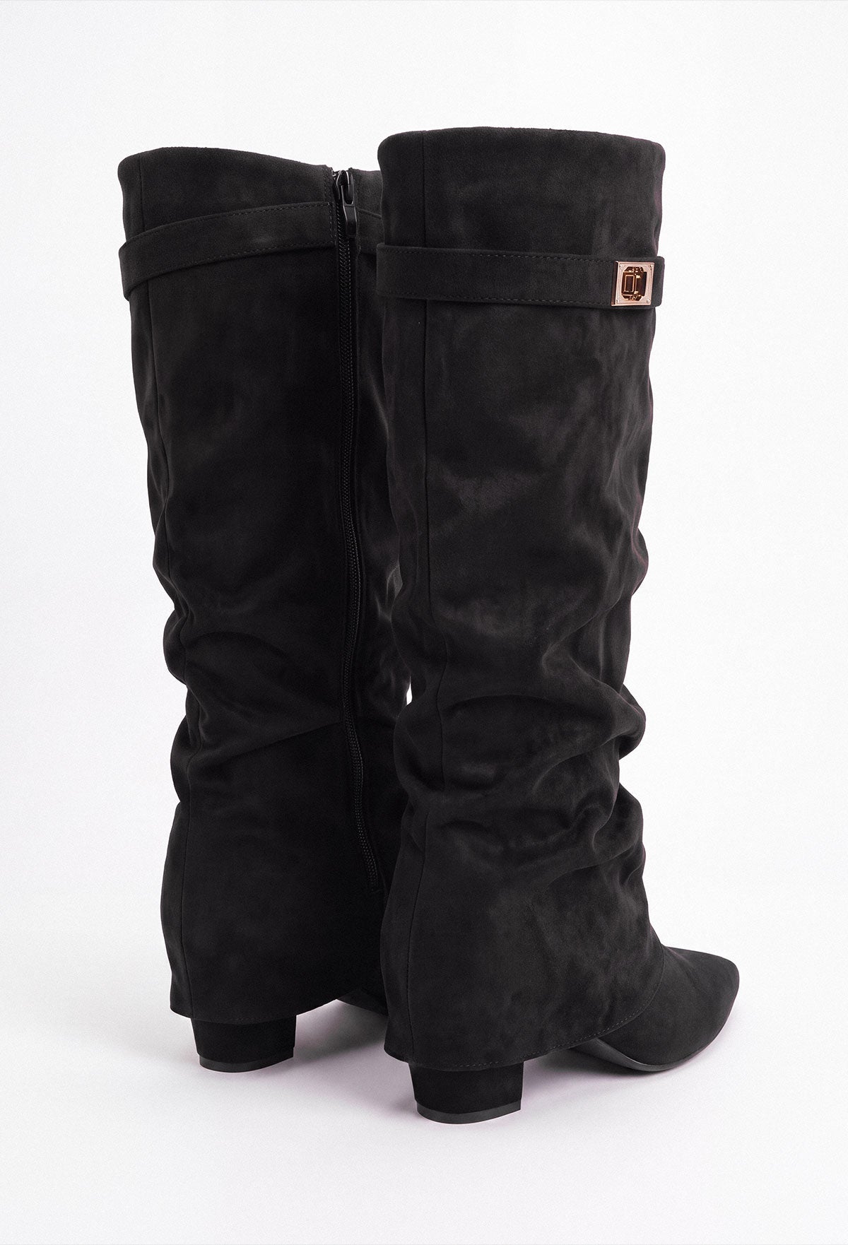 Black faux suede fold over maxi lock shark boot with pointed toe, slouchy shaft and gold lock detail.