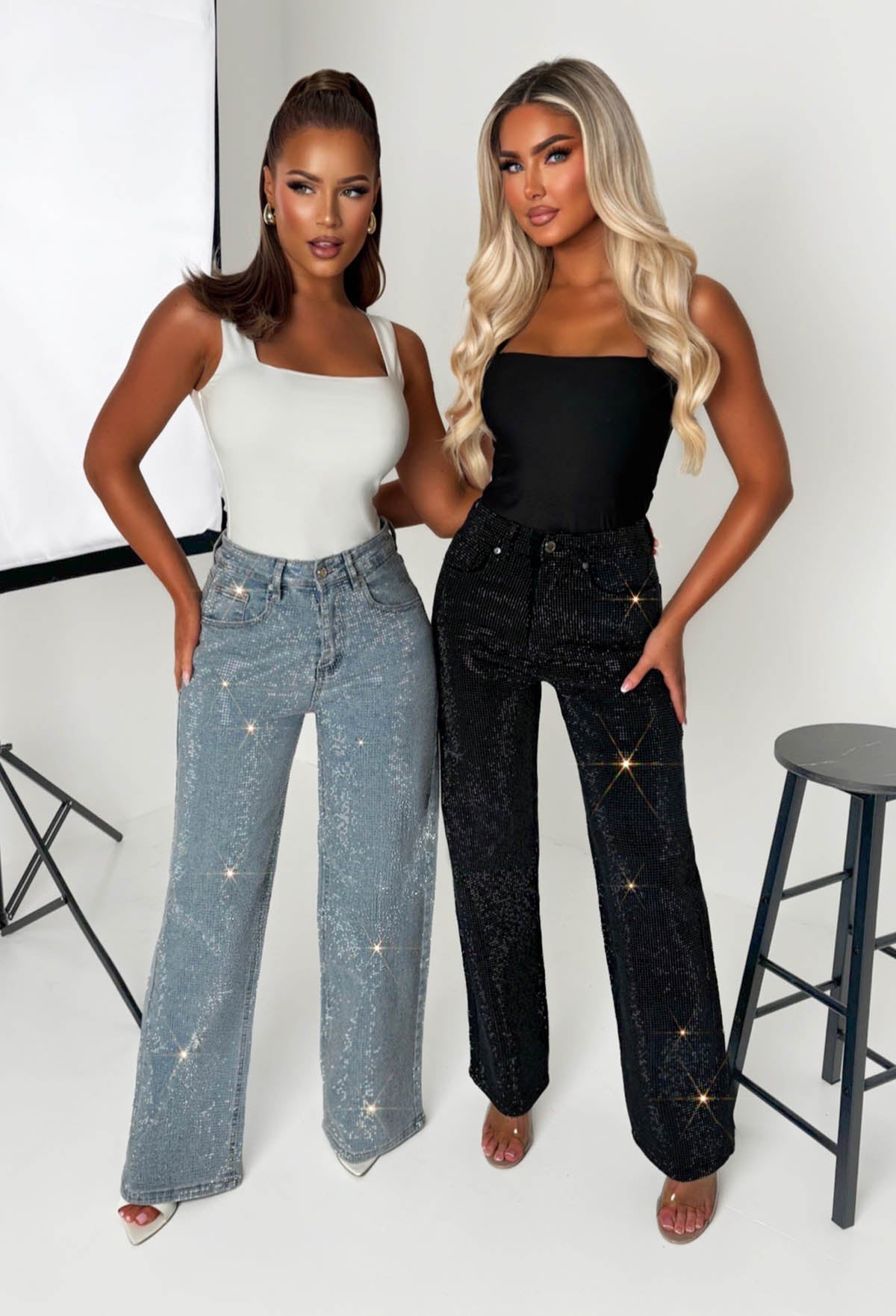 Mid wash straight leg stretch diamante jeans with all-over sparkling embellishments and classic five-pocket design.