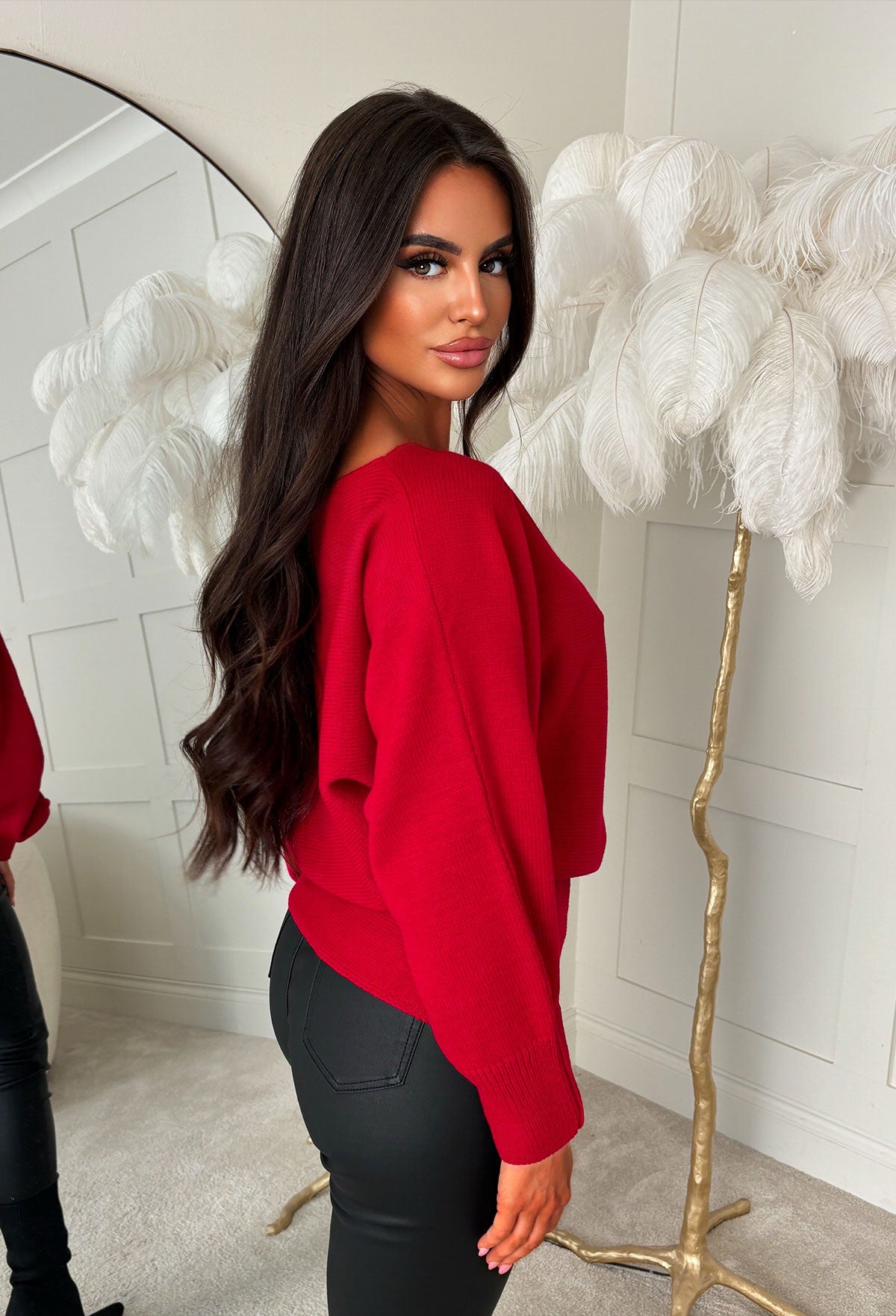 Red ultra soft off the shoulder jumper with relaxed fit, long sleeves and ribbed cuffs.