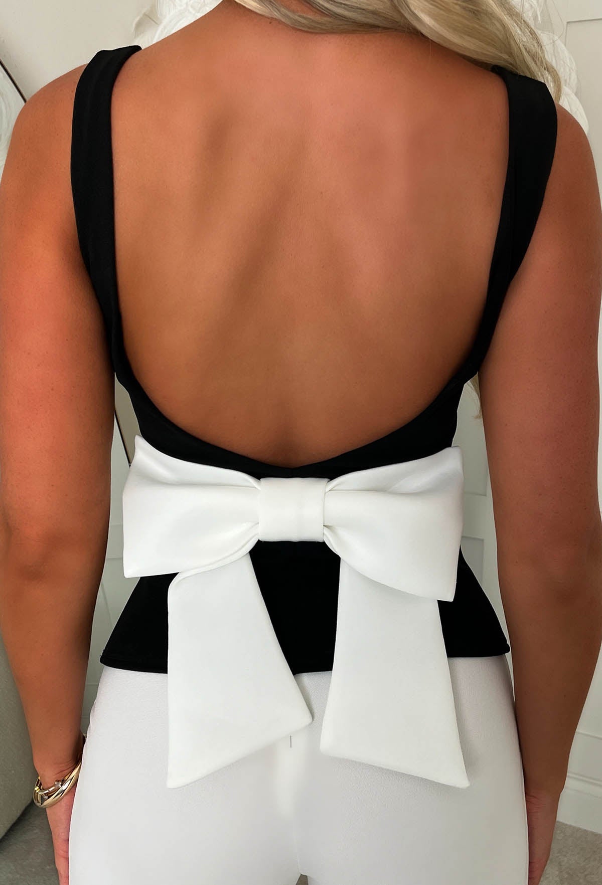 Bow Belle Black Bow Back Peplum Top
