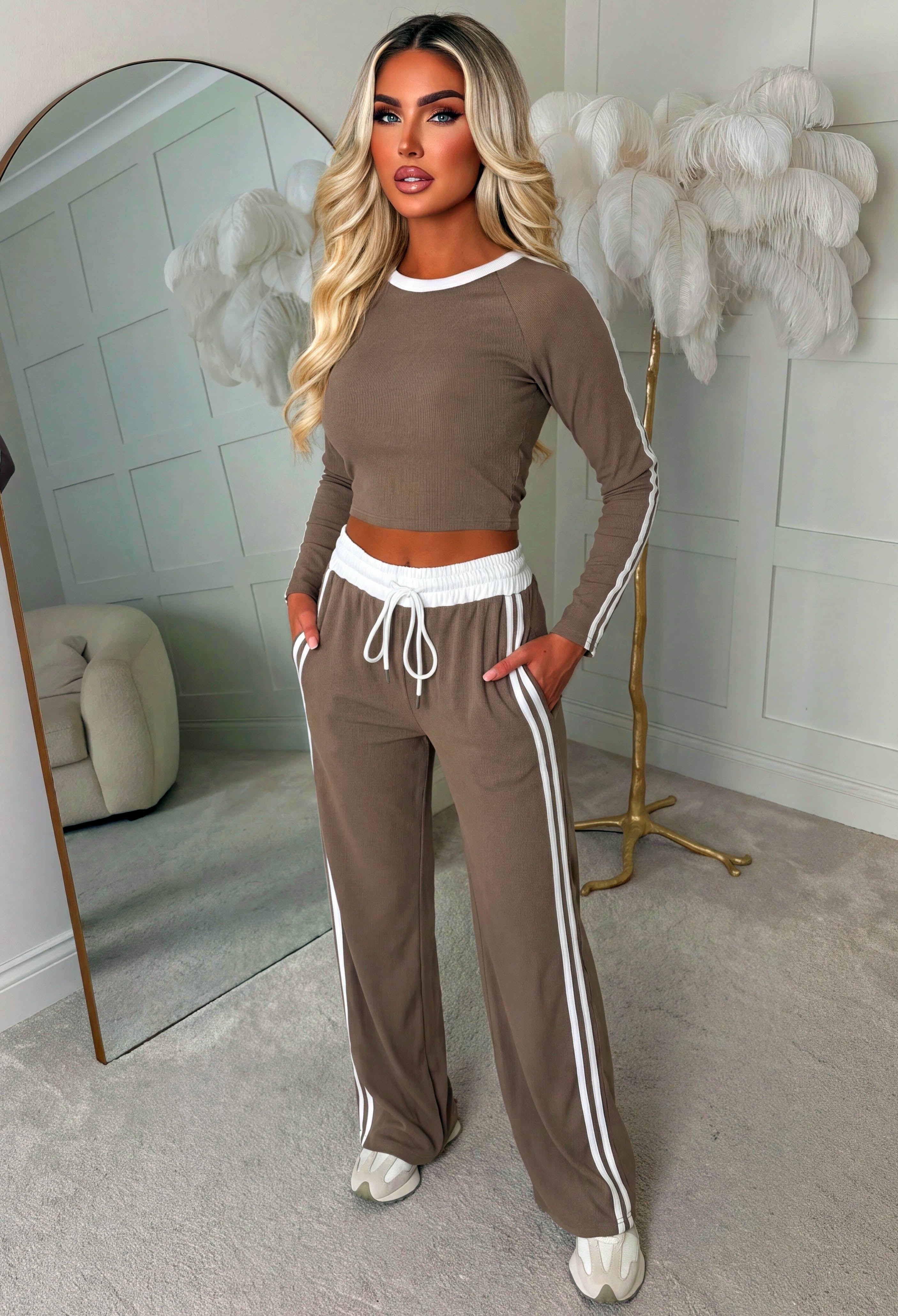 Mocha side stripe loungewear set featuring a ribbed long sleeve top with white trim neckline and wide leg trousers.