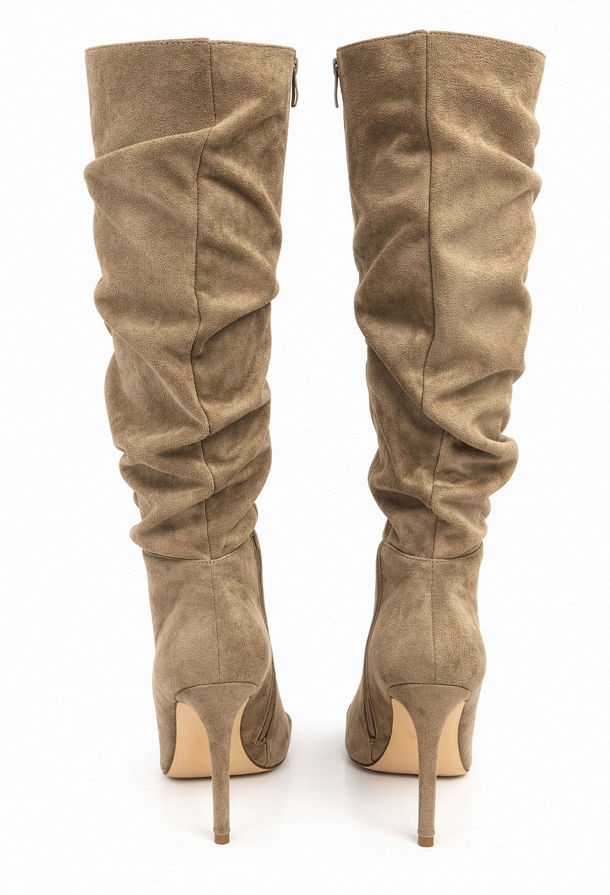 Neutral ruched knee high faux suede boots with pointed toe and high stiletto heel.