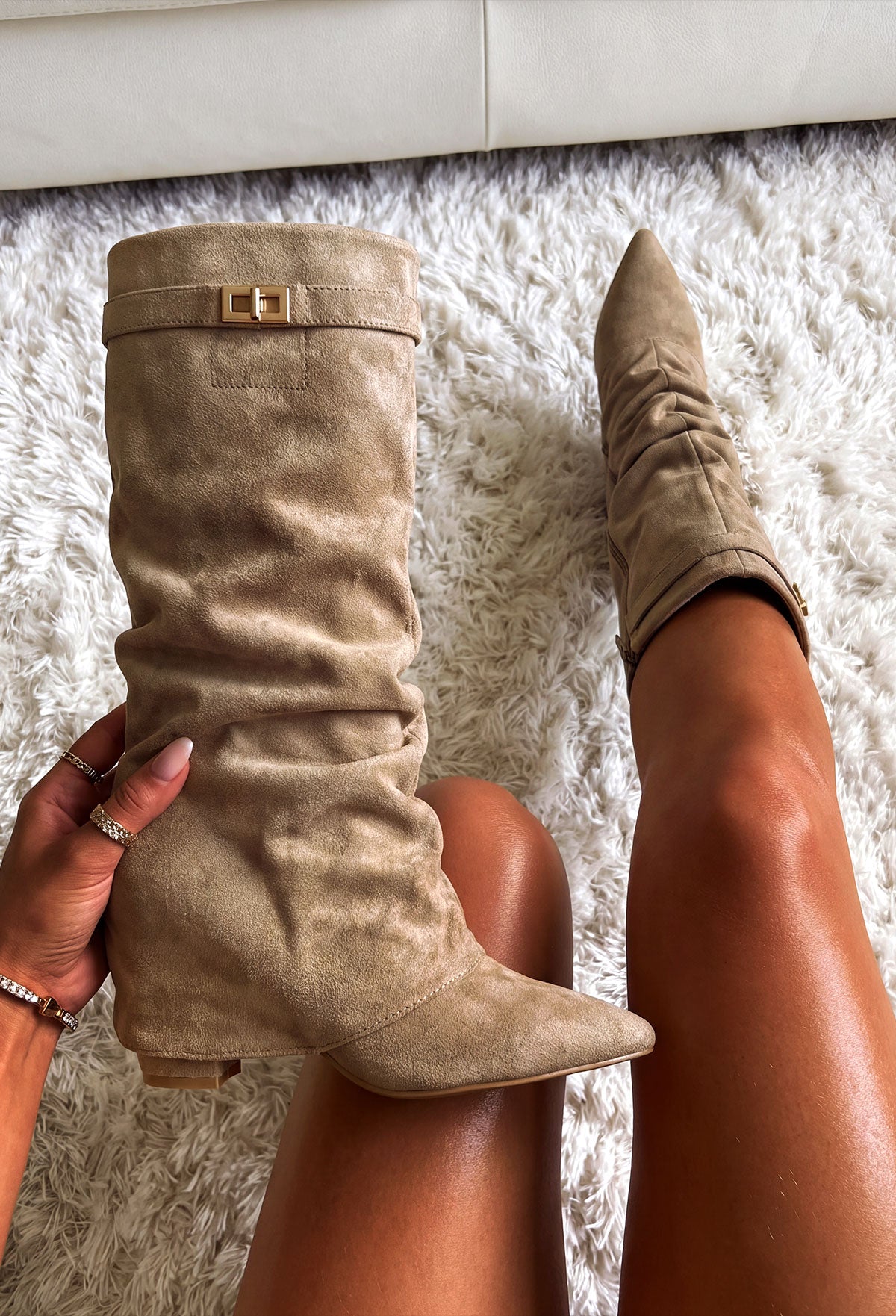 Taupe faux suede fold over maxi lock shark boot with pointed toe and gold buckle detail at the top.