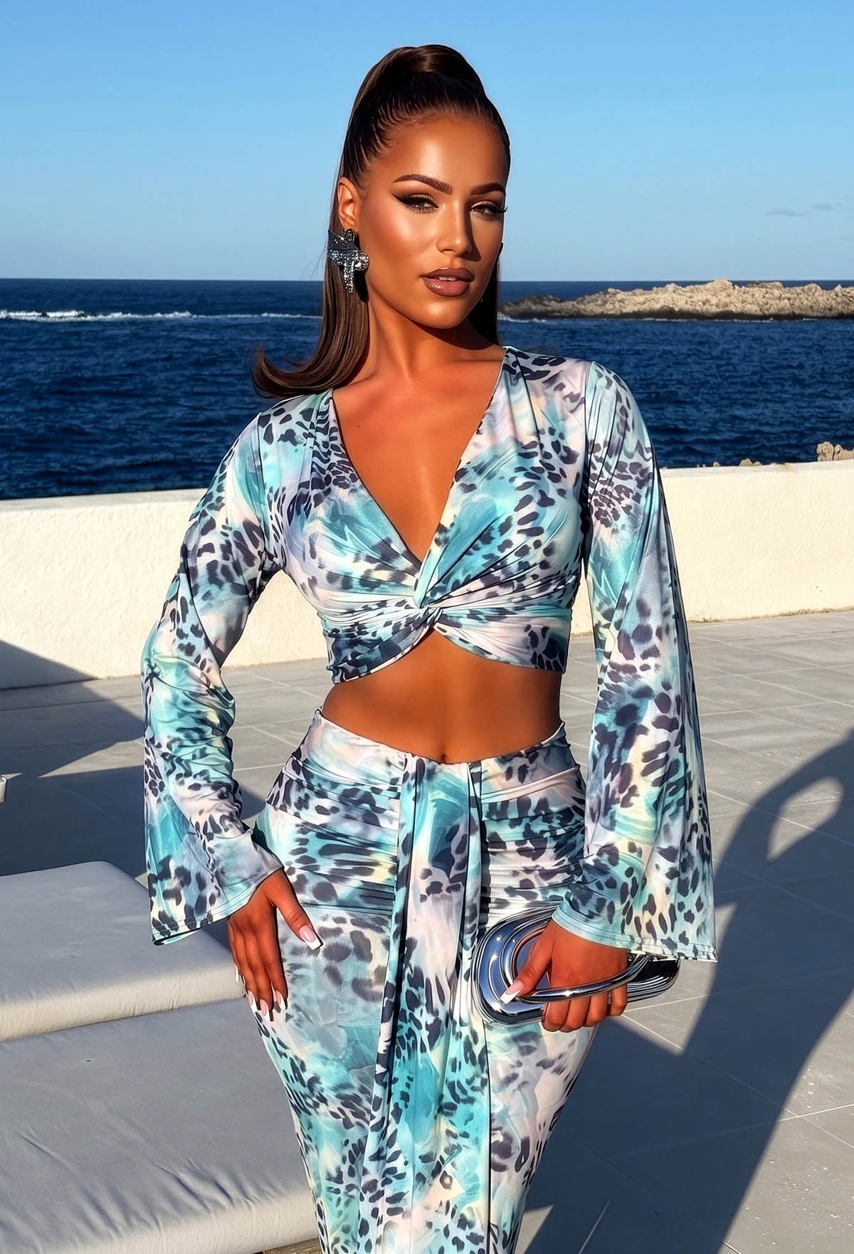 Model in Holiday Villa wearing Blue Leopard Print Knot Front Top & Skirt Co-Ord Set Close Up Front View 