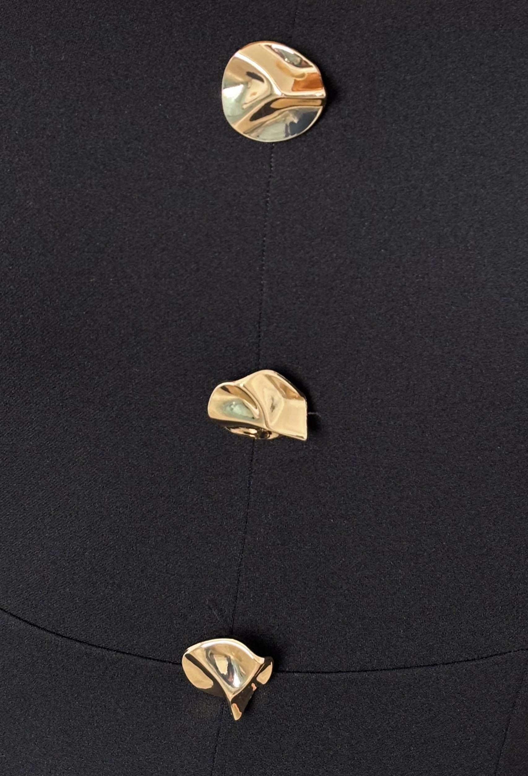 detailed shot of gold buttons