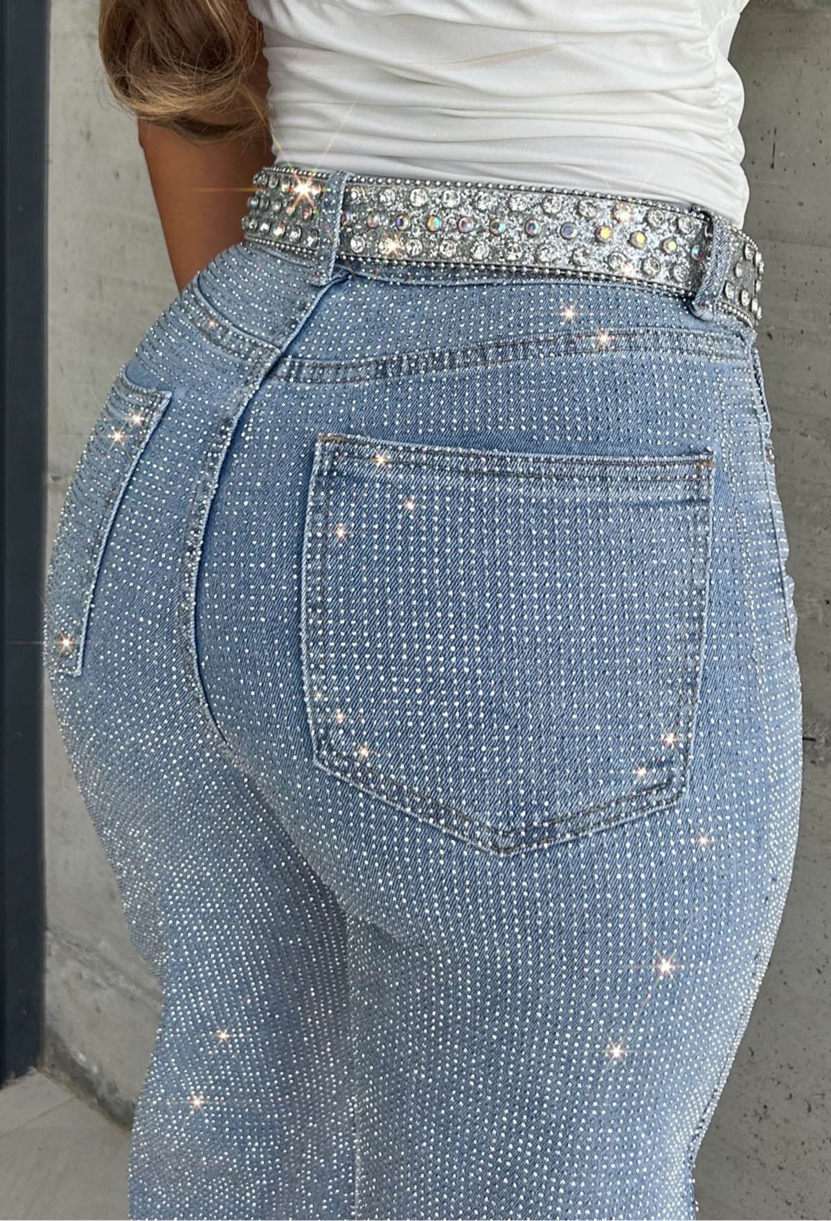 Mid wash straight leg stretch diamante jeans with all-over sparkling embellishments and classic five-pocket design.