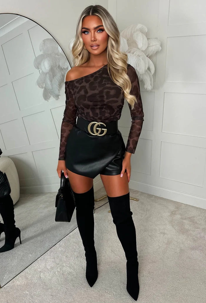 Brown leopard print mesh top with an off shoulder neckline, sheer long sleeves and ruched side detail.