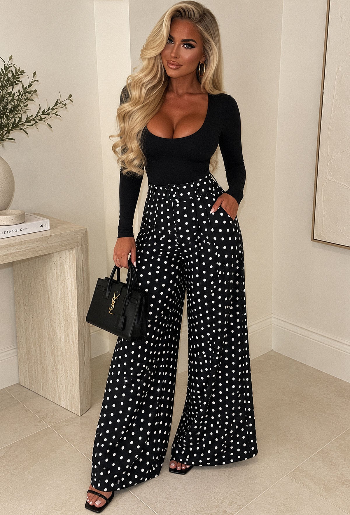 Black polka dot wide leg belted trousers with high waist, detachable belt and relaxed, flowing fit.